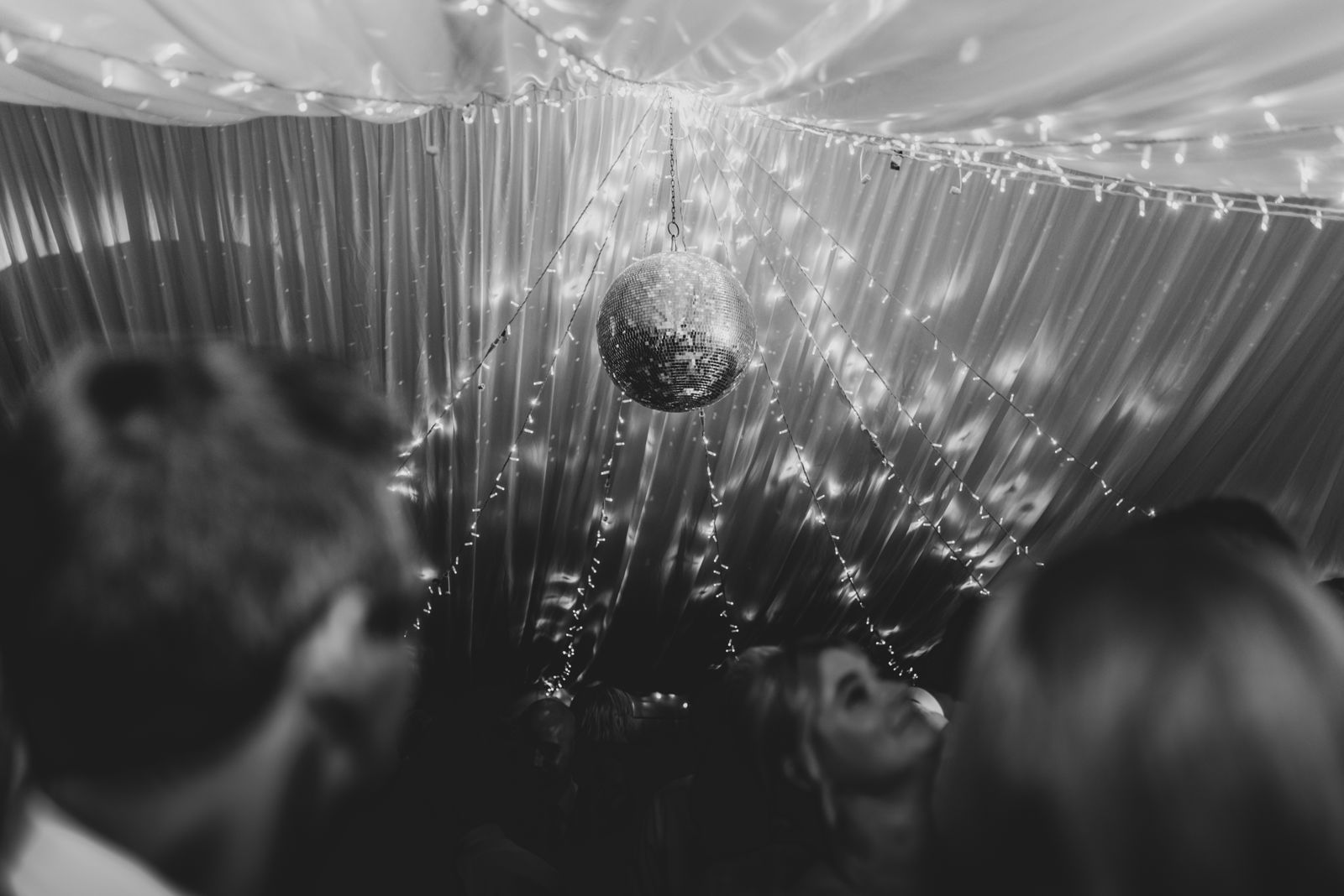 A beautifully dressed black-tie charity gala ballroom