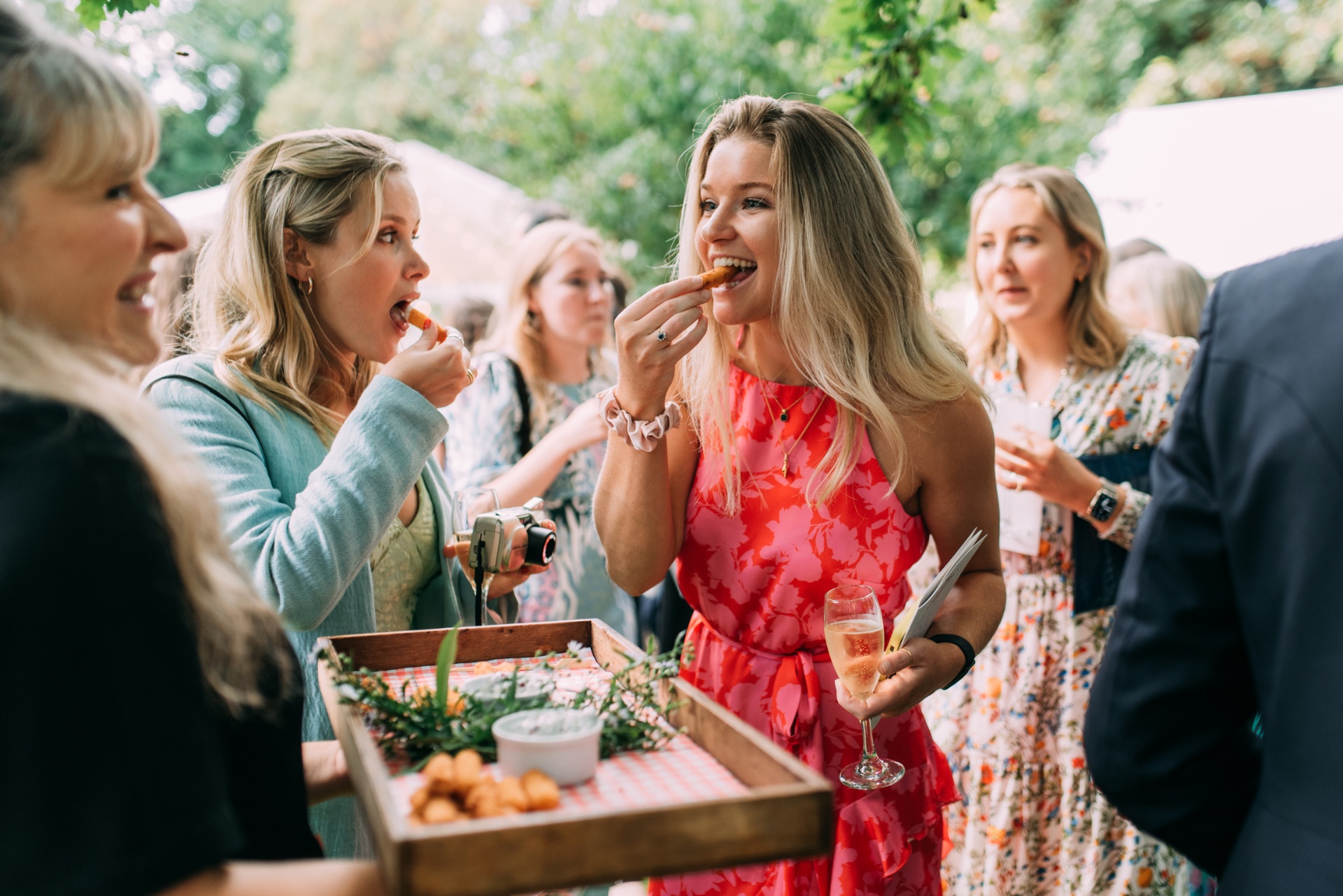 Guests enjoying canapés at a private celebration